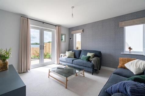 10. Seperate living room with views of garden.jpg