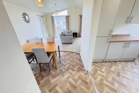 DINING INTO KITCHEN &amp; SITTING AREA