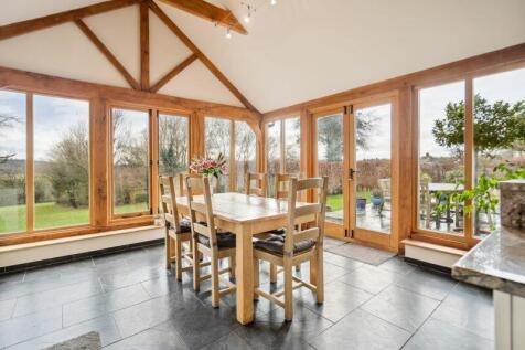 Dining area with vaulted ceiling