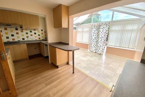 Kitchen And Sun Lounge