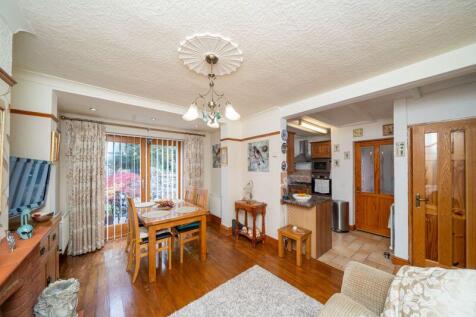 DINING/SITTING ROOM OPENS TO KITCHEN