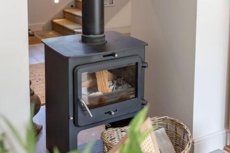 Wood burner in entrance