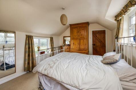 Greystoke Cottage-bed1.jpg