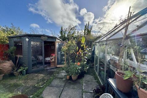 Greenhouse And Summer House