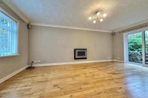 Large living room with doors to garden