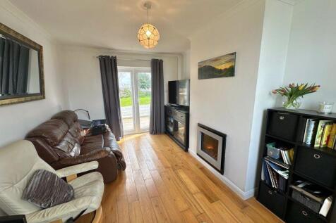 Living room with doors to garden