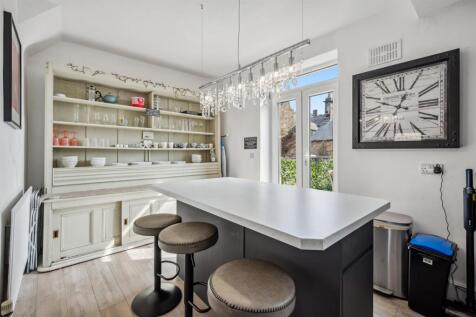 Kitchen - island and doors to balcony terrace.jpg