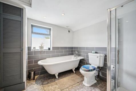 Bathroom One - bath.jpg