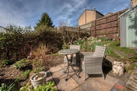 Rear Garden - upper dining patio.jpg