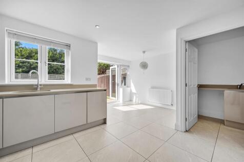 Kitchen to dining area and utility room.jpg