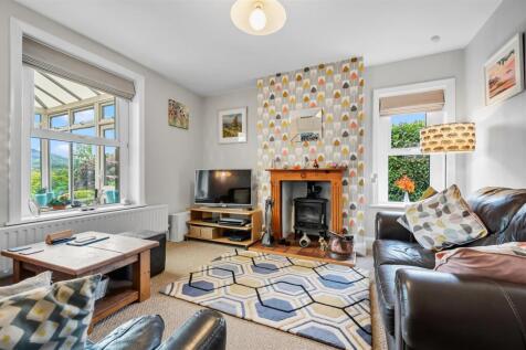 Sitting Room - fireplace and windows.jpg