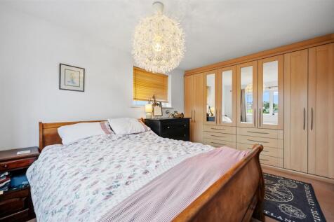 Bedroom One - bed and wardrobes.jpg