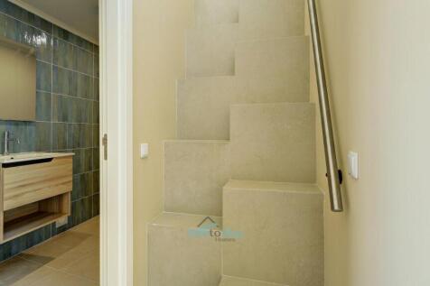 guest toilet and staircase to mezzanine