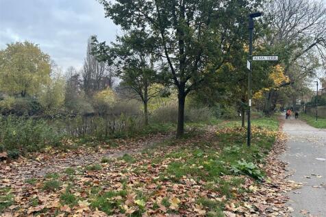 River and Alma Terrace sign.jpg