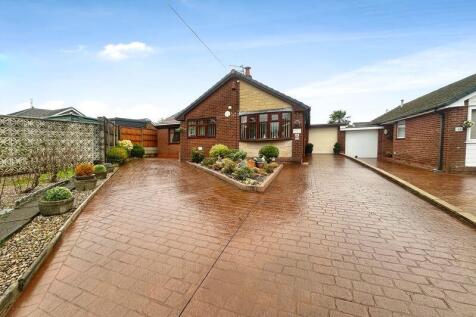 Front Elevation/ Driveway 