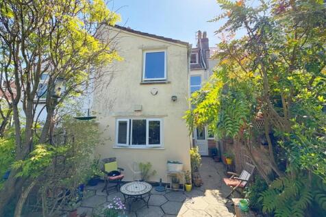 Rear view of property and patio.jpg