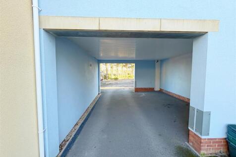 Access through carport to parking space.jpg