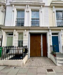 Gate at front of mews