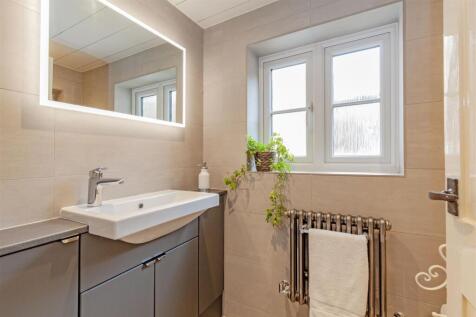 Fully Tiled Cloakroom/WC