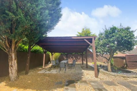 Patio covered by large PERGOLA (with power)