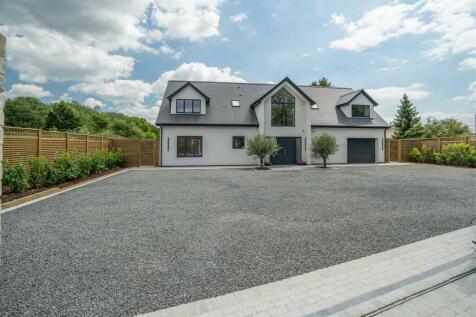 Electric Sliding Wooden Clad Gate to Driveway