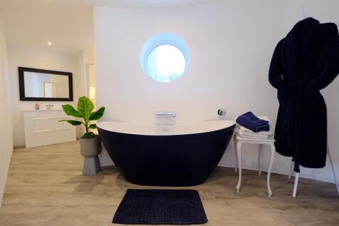 Main en suite bathroom and shower room