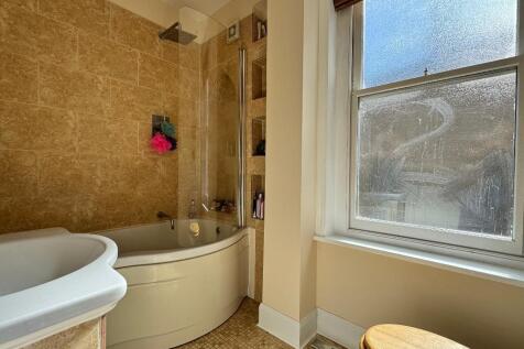 Bathroom with frosted sash window