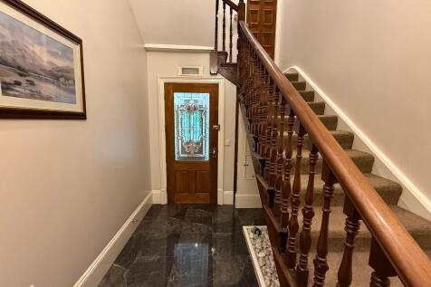 Main entrance door, stairs up to Flat 3