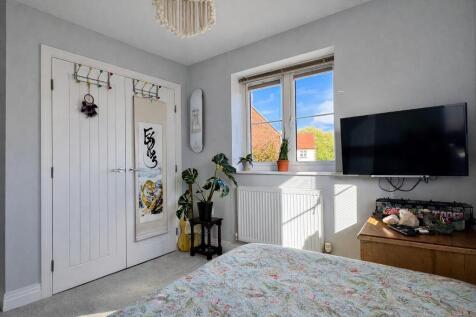 Bedroom 2 with fitted wardrobe