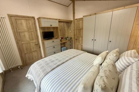 Bedroom 1 showing fitted wardrobes