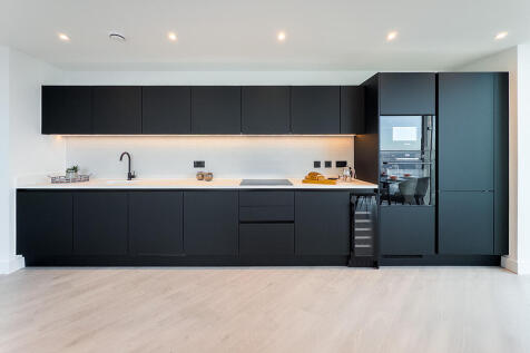 Black Kitchen with White Worktop