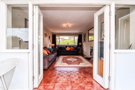 Doors from Sun Room into Sitting Room