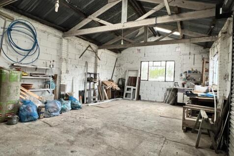 Detached double garage/workshop