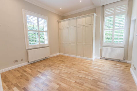 Bedroom 2 with wardrobes