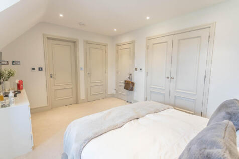 Bedroom 2 with wardrobes