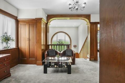 Large open landing area with impressive window
