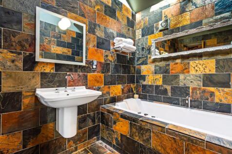 Family Bathroom with jet bath and rainfall shower