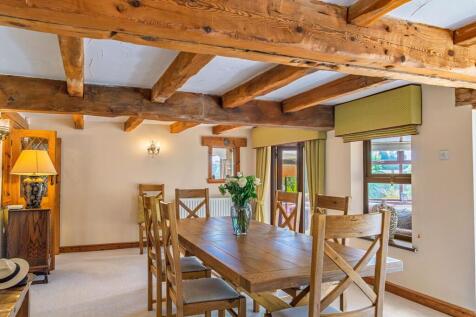Dining room with patio doors to the Sun Room