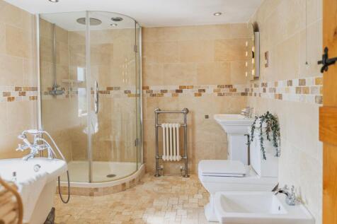 Family Bathroom complete with roll top bath and Shower