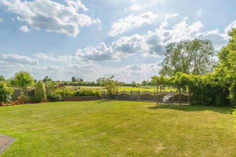 Luscious landscaping with spacious garden