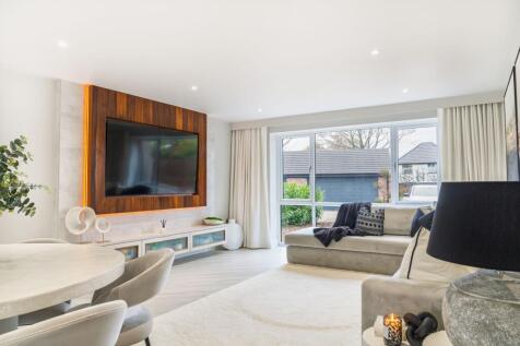 Main lounge with walnut media wall