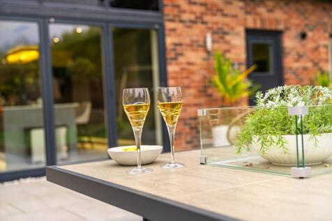 Large seating area in the rear garden