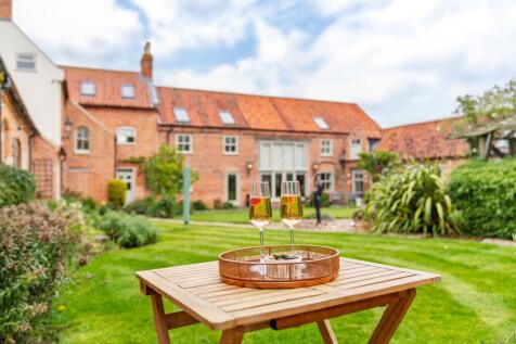 Enclosed courtyard perfect for dining out in the summer