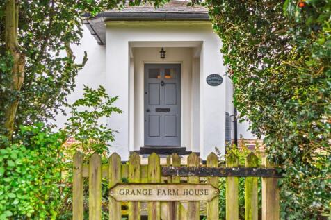 Tucked behind mature hedging