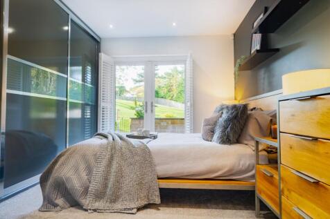 Bedroom 4 with access to the garden