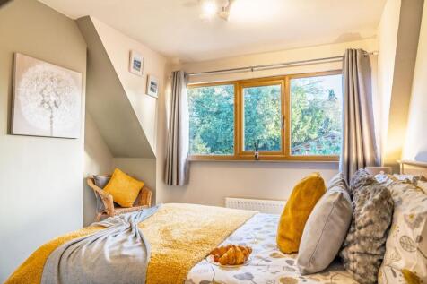 Annexe bedrooms with far reaching views onto the garden