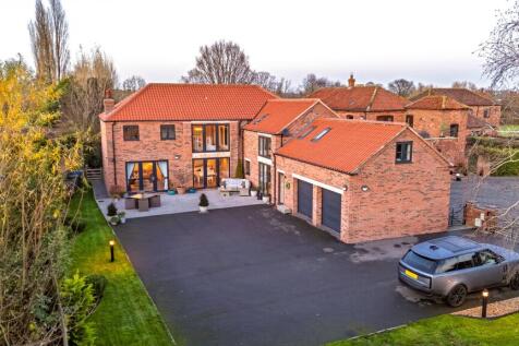Private rear garden with additional gated parking area