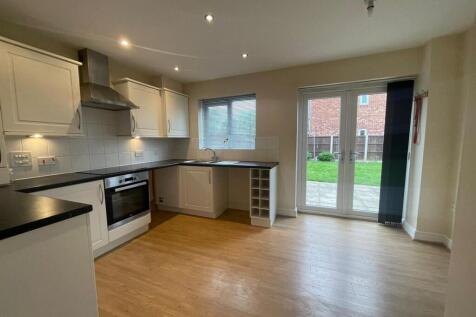 Double doors onto the rear garden