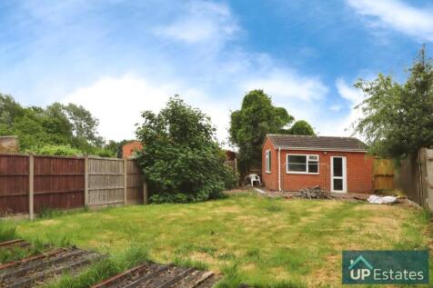 REAR GARDEN WITH GARAGE