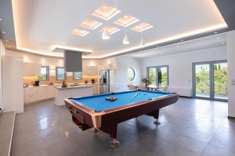 Pool table and kitchen